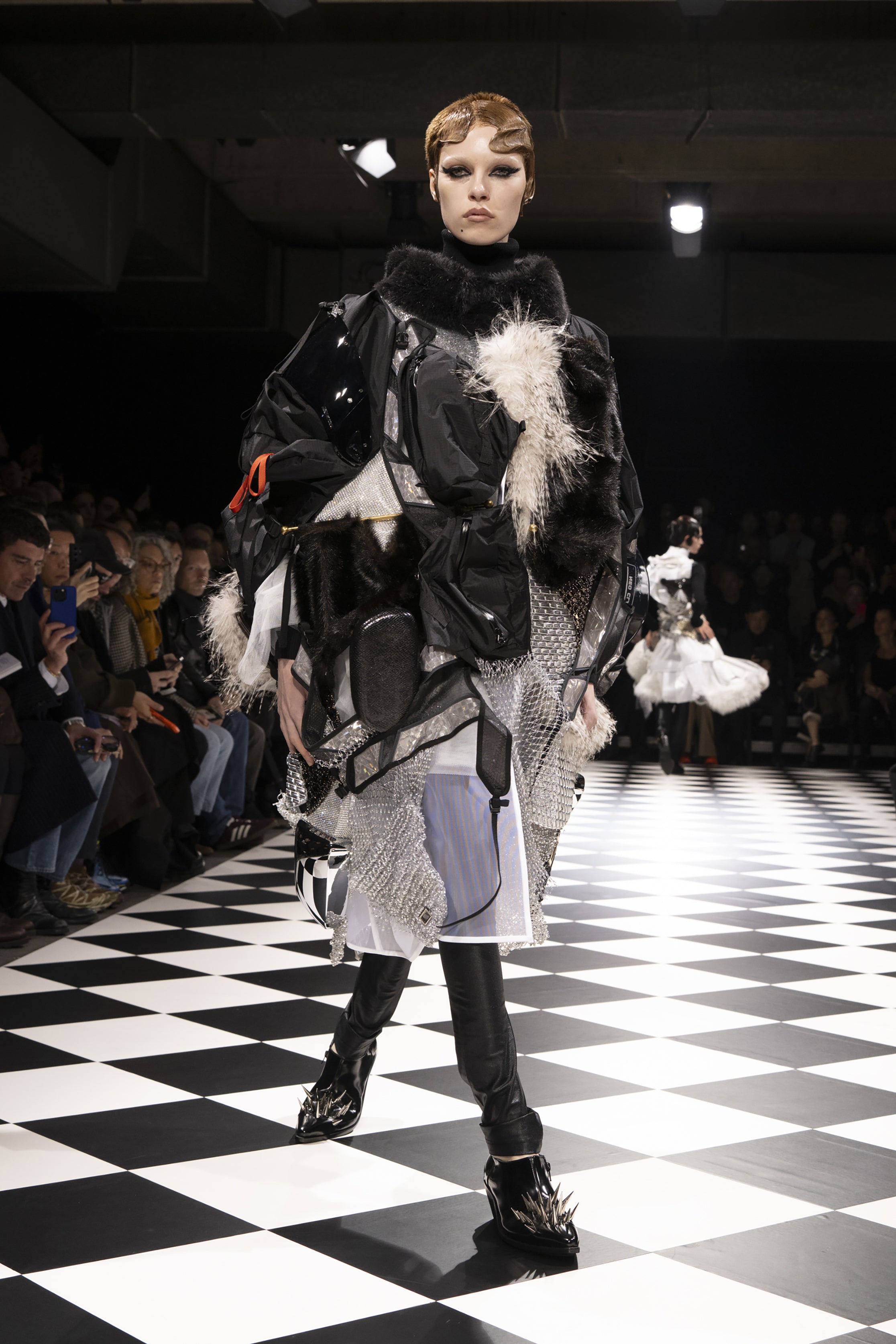 Fashion model wearing a JUNYA WATANABE AW26 outfit