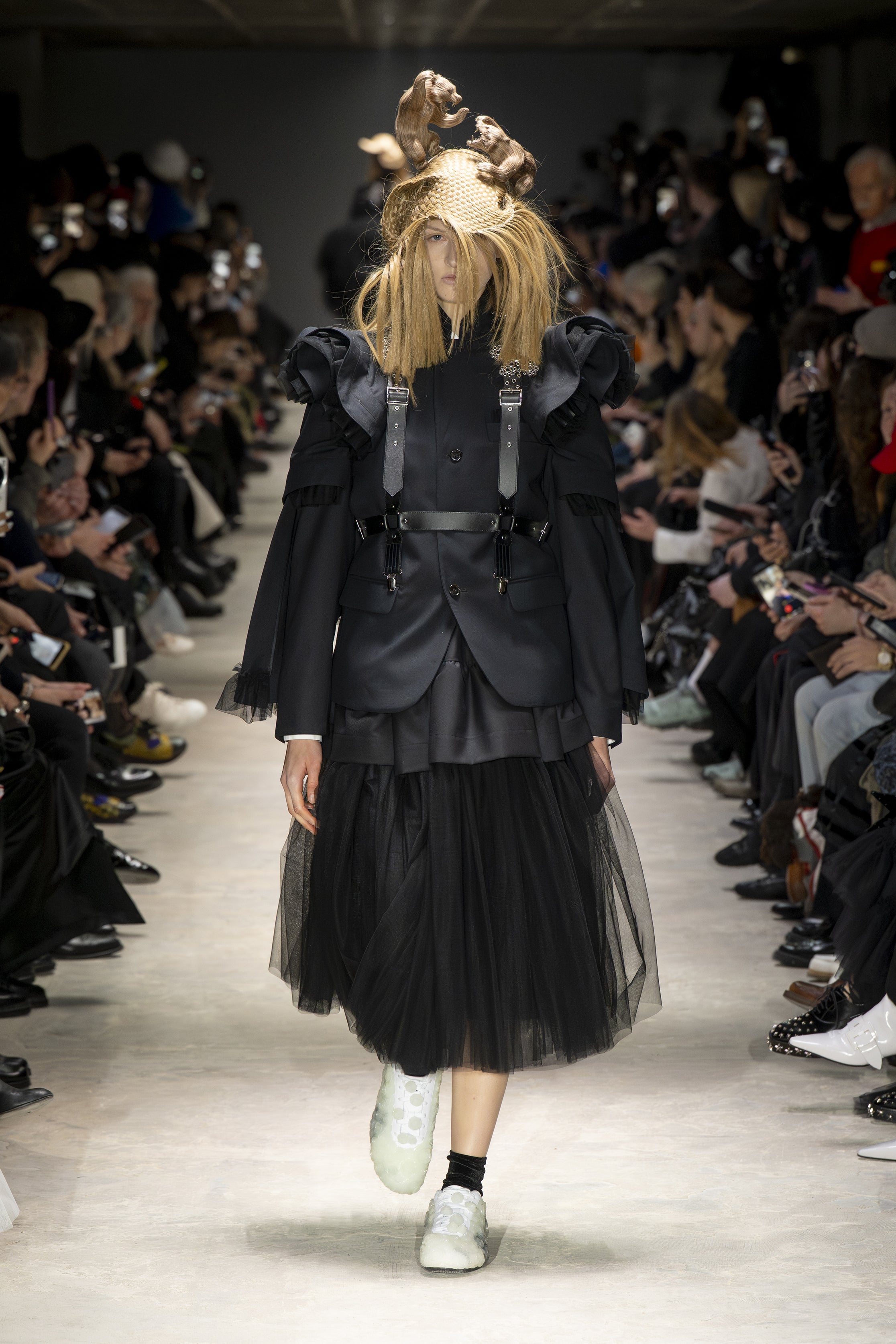 Fashion model wearing a NOIR KEI NINOMIYA AW26 outfit
