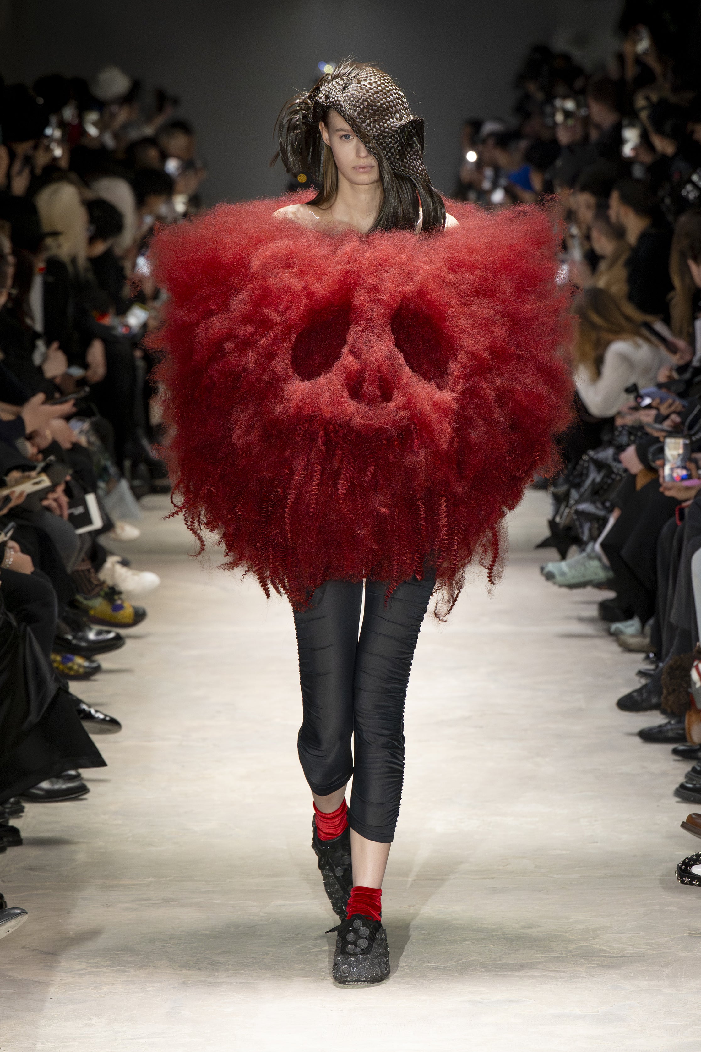 Fashion model wearing a NOIR KEI NINOMIYA AW26 outfit