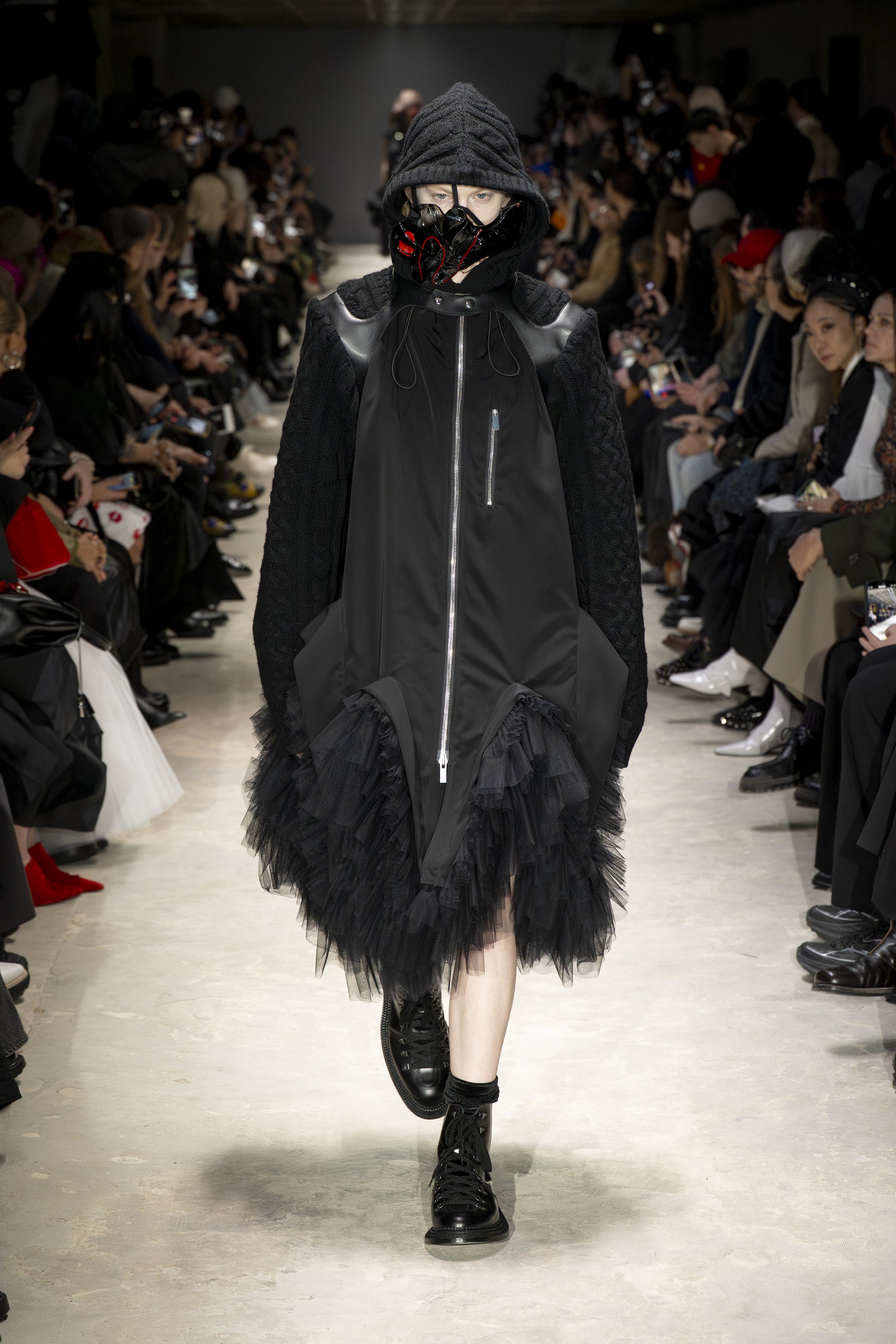 Fashion model wearing a NOIR KEI NINOMIYA AW26 outfit