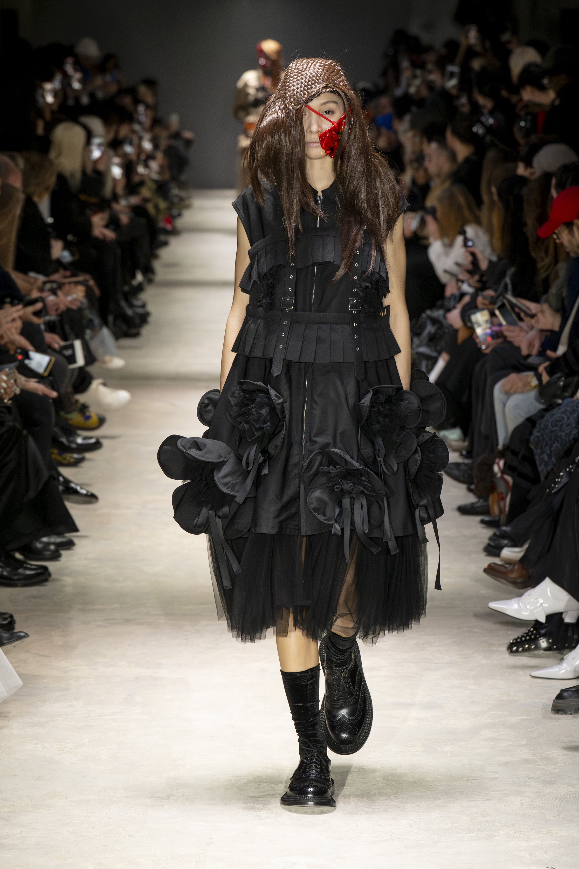 Fashion model wearing a NOIR KEI NINOMIYA AW26 outfit