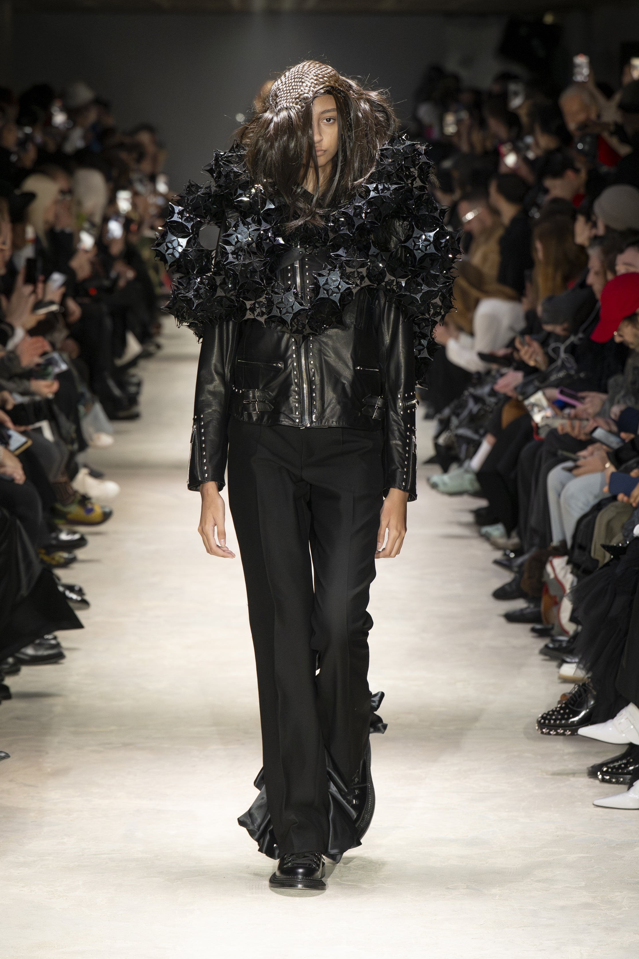 Fashion model wearing a NOIR KEI NINOMIYA AW26 outfit