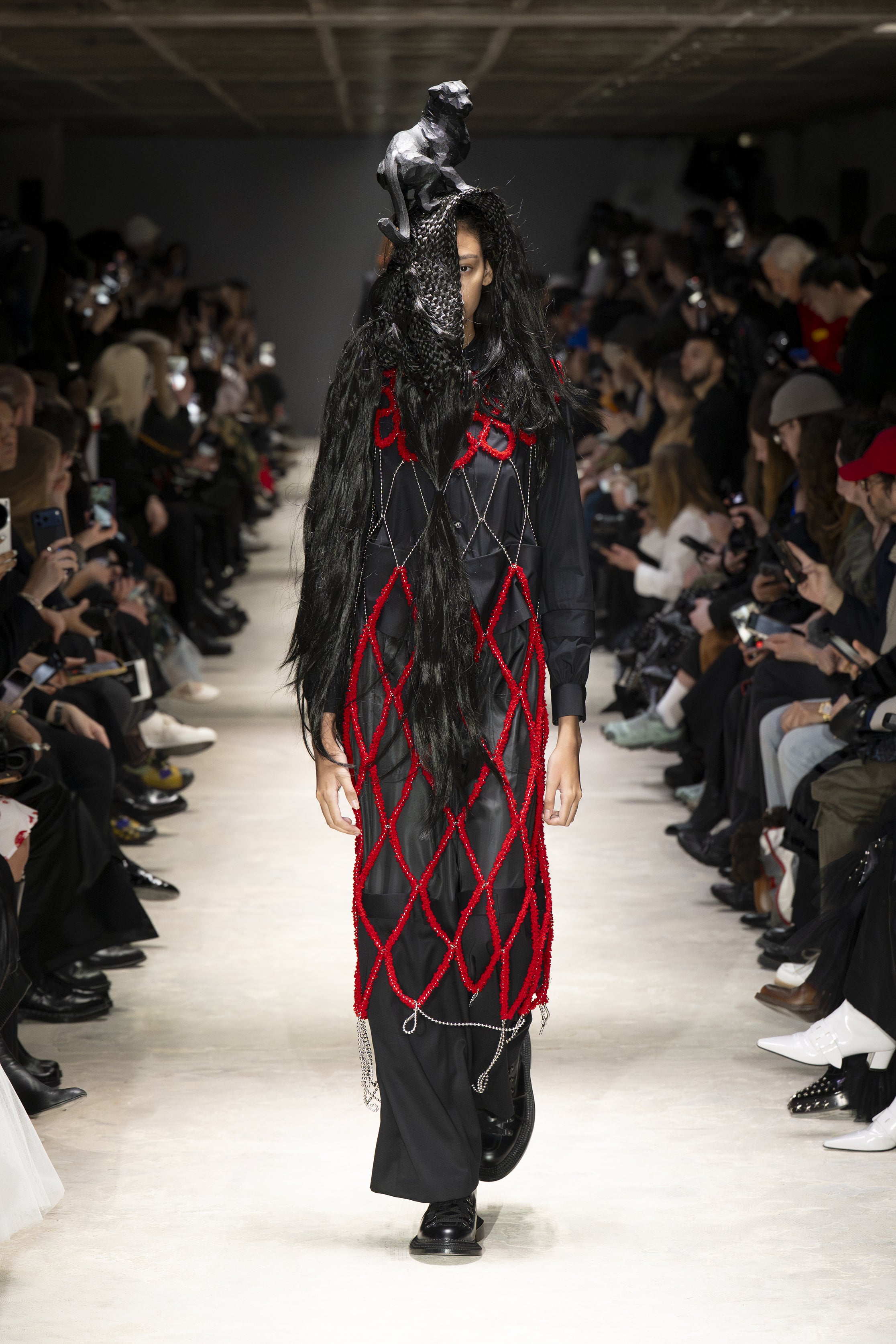 Fashion model wearing a NOIR KEI NINOMIYA AW26 outfit