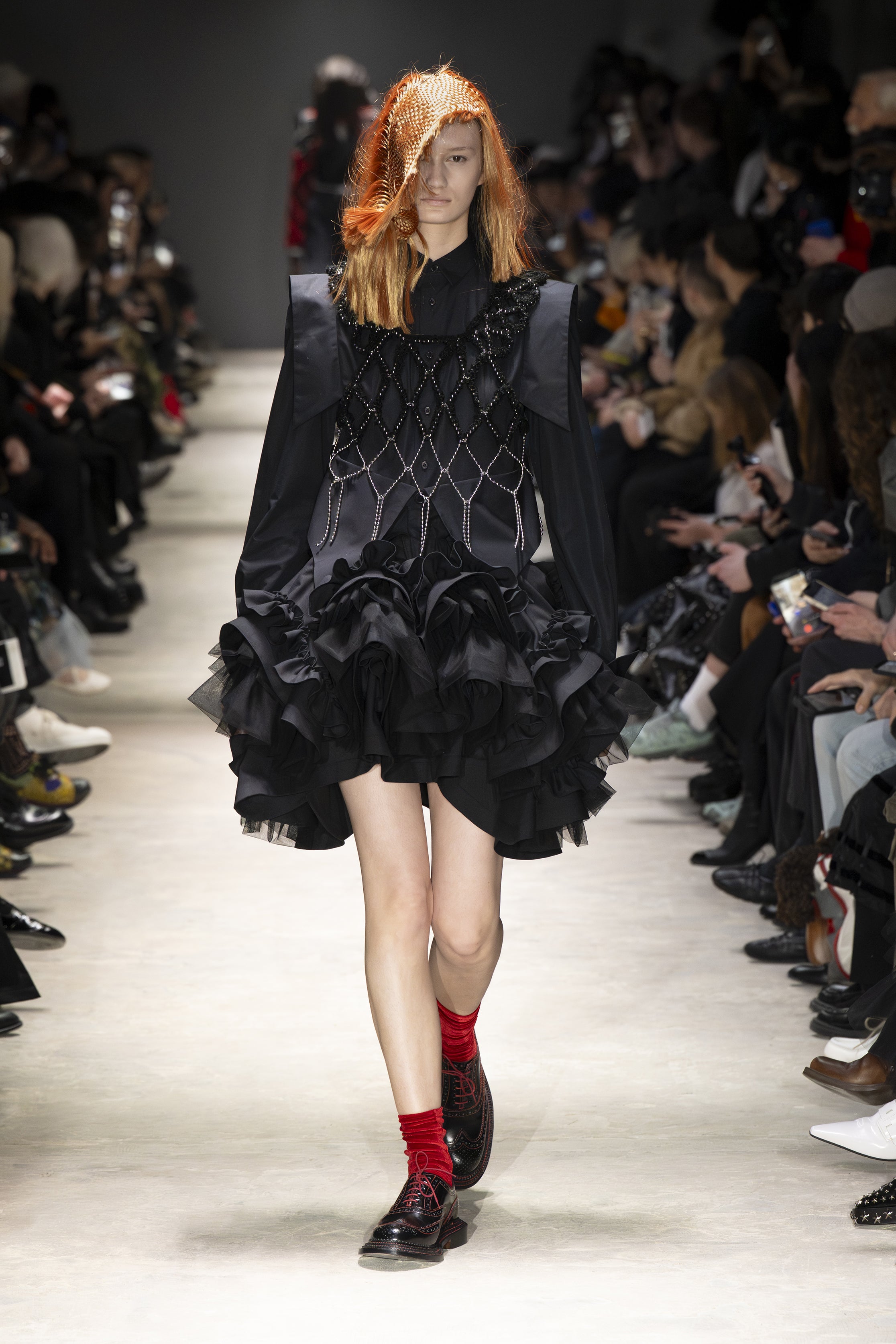 Fashion model wearing a NOIR KEI NINOMIYA AW26 outfit