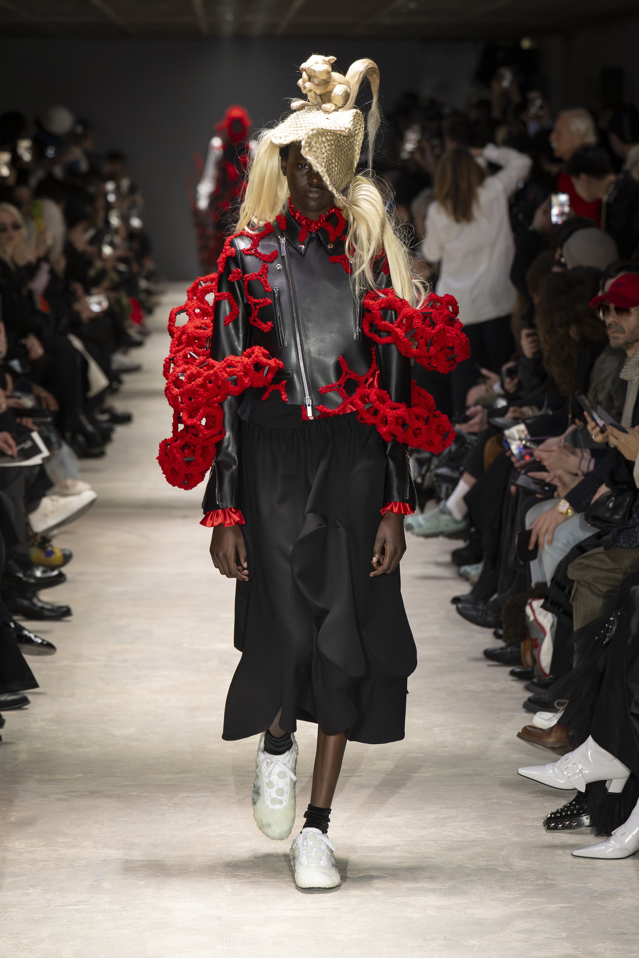 Fashion model wearing a NOIR KEI NINOMIYA AW26 outfit