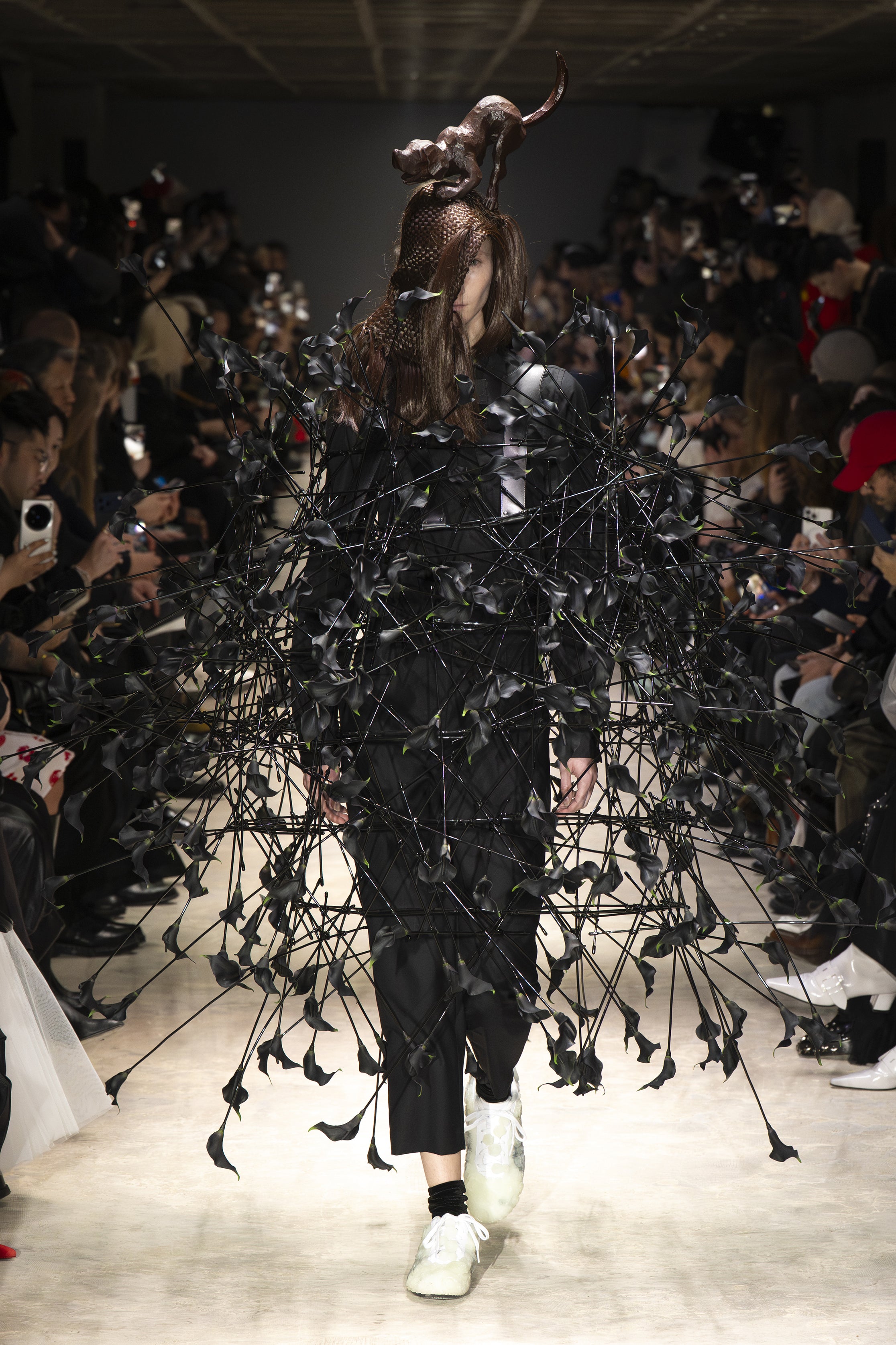 Fashion model wearing a NOIR KEI NINOMIYA AW26 outfit