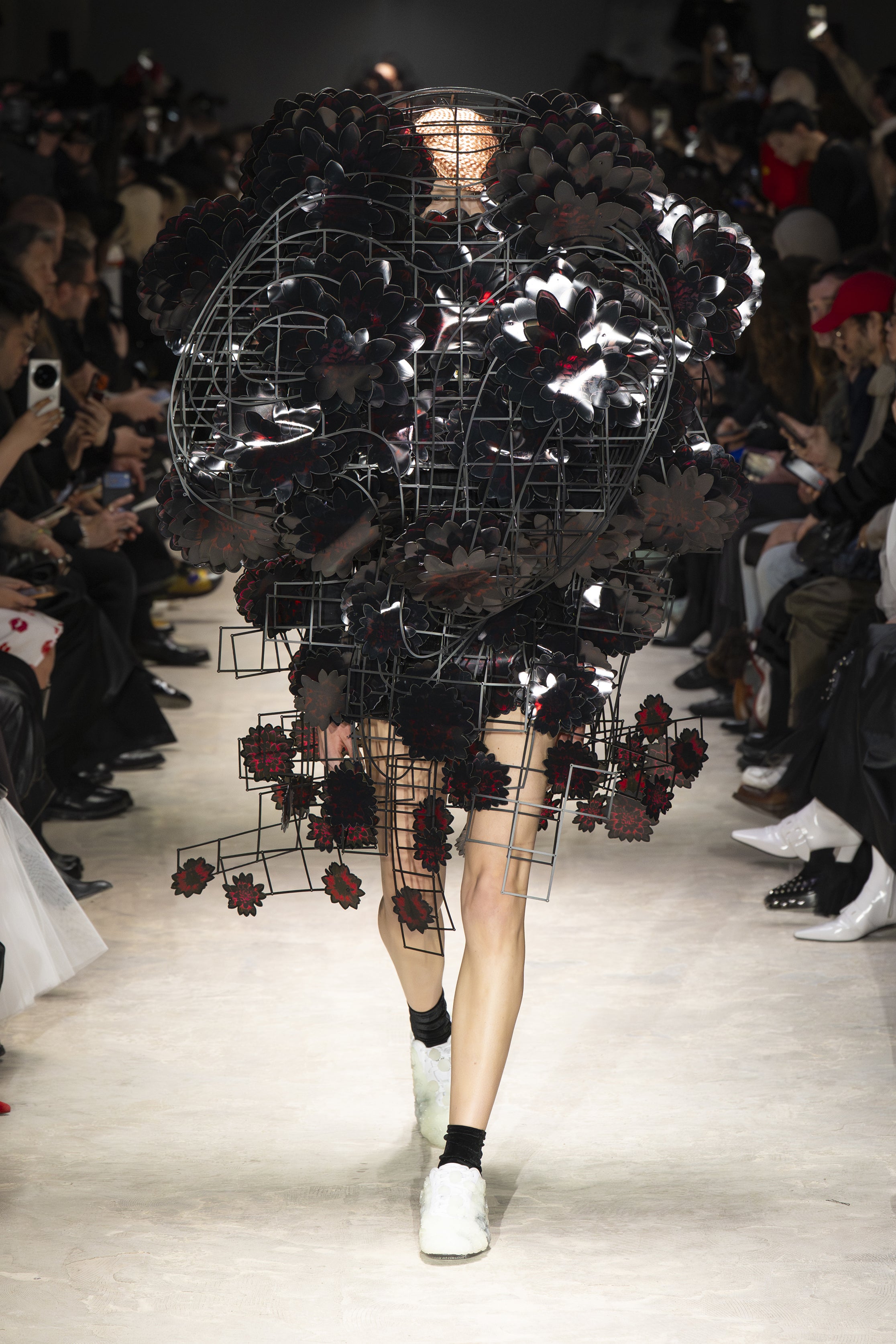 Fashion model wearing a NOIR KEI NINOMIYA AW26 outfit