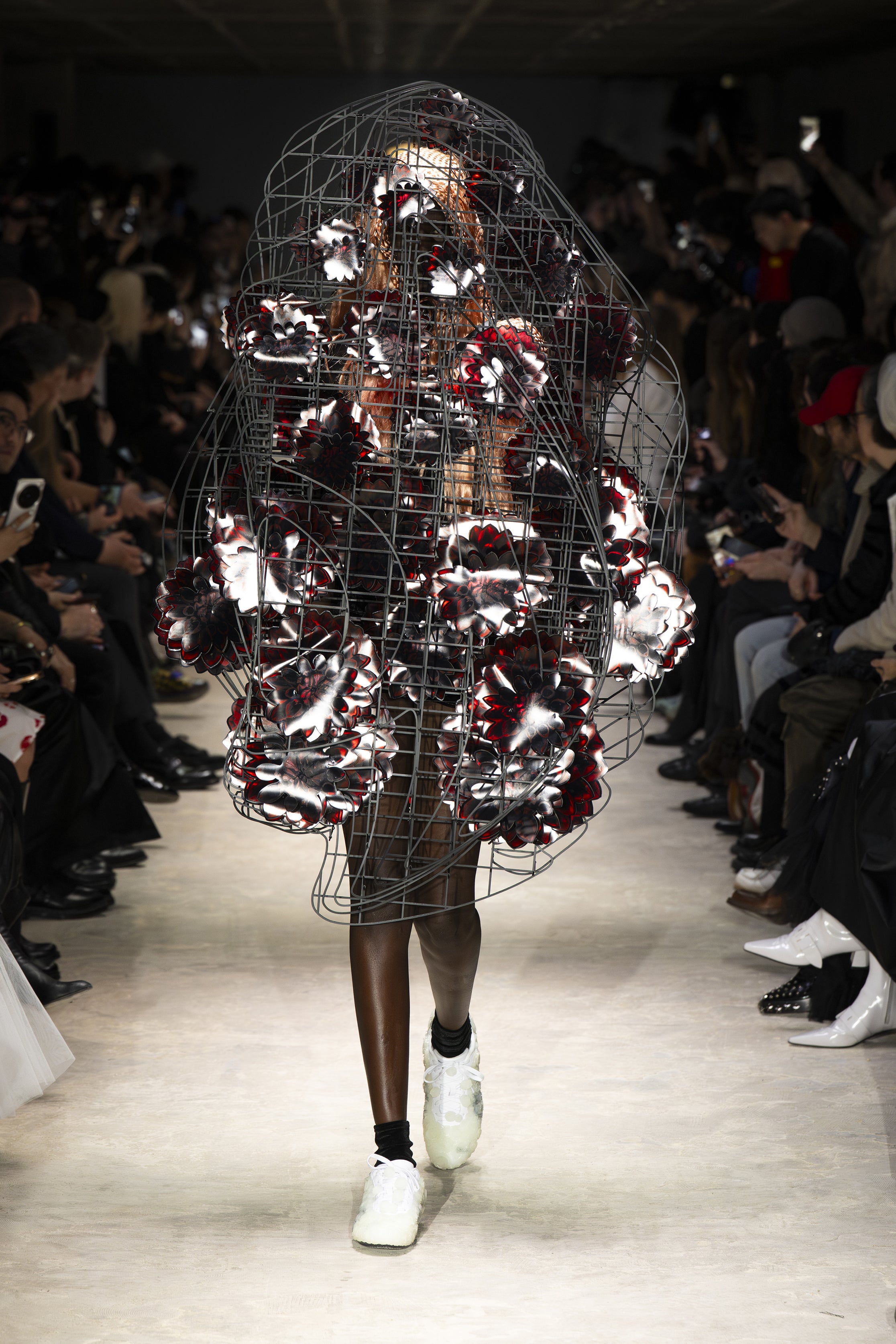 Fashion model wearing a NOIR KEI NINOMIYA AW26 outfit