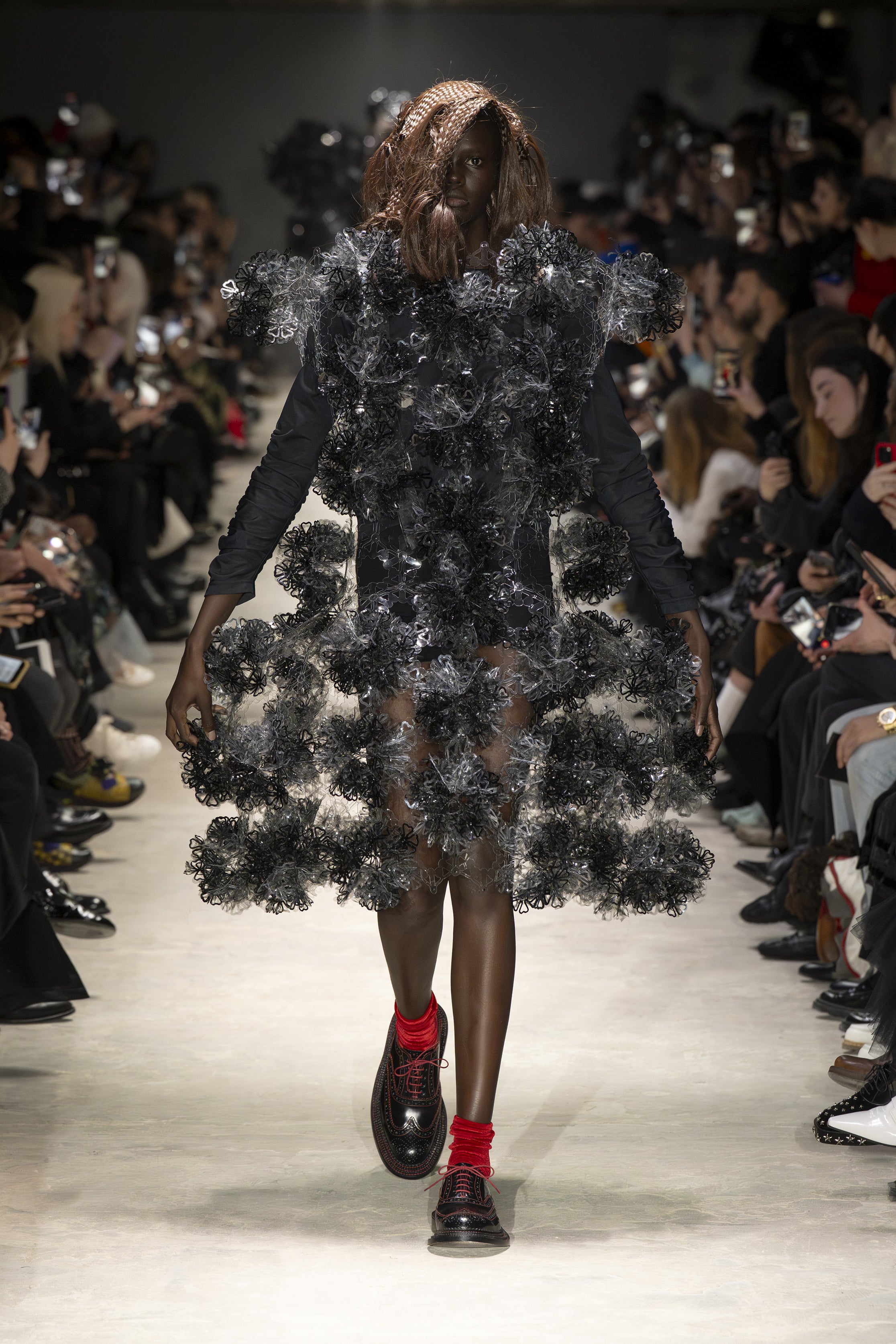 Fashion model wearing a NOIR KEI NINOMIYA AW26 outfit
