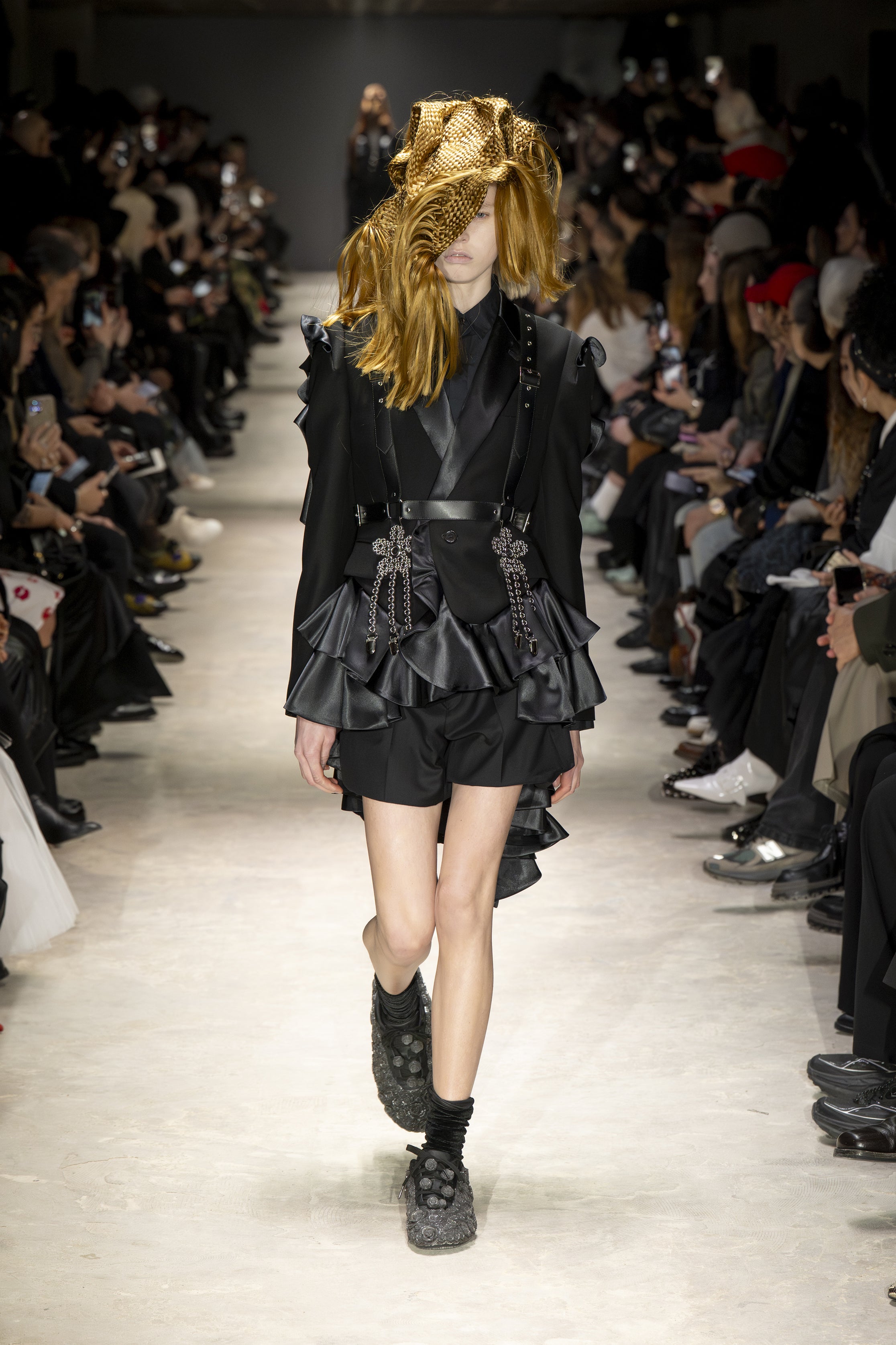 Fashion model wearing a NOIR KEI NINOMIYA AW26 outfit
