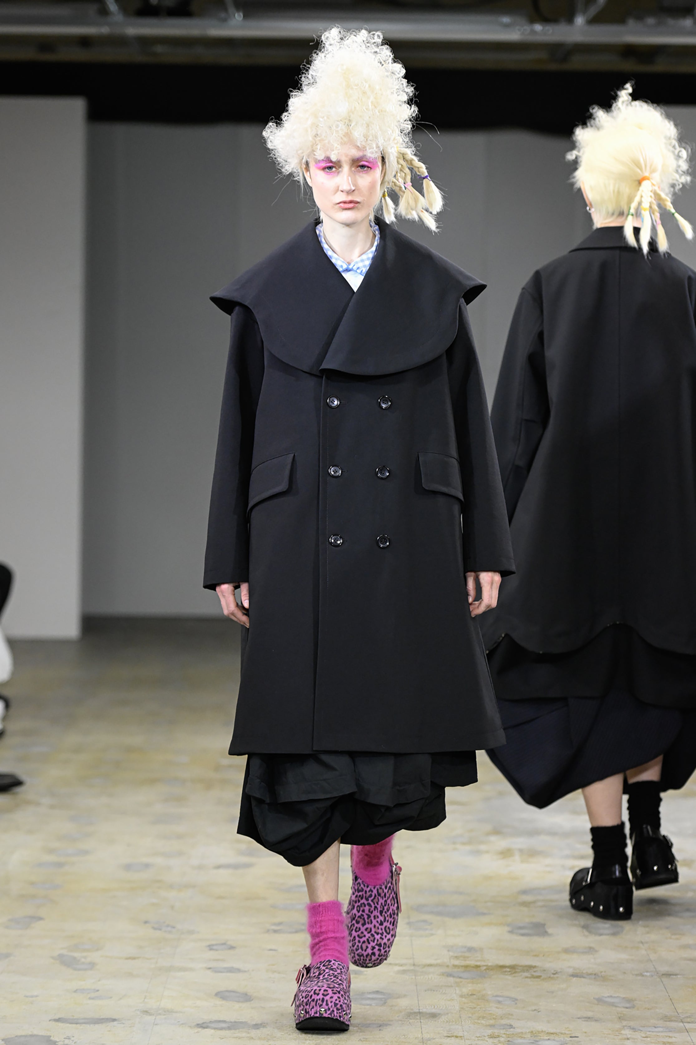 Fashion model wearing a tao AW26 outfit