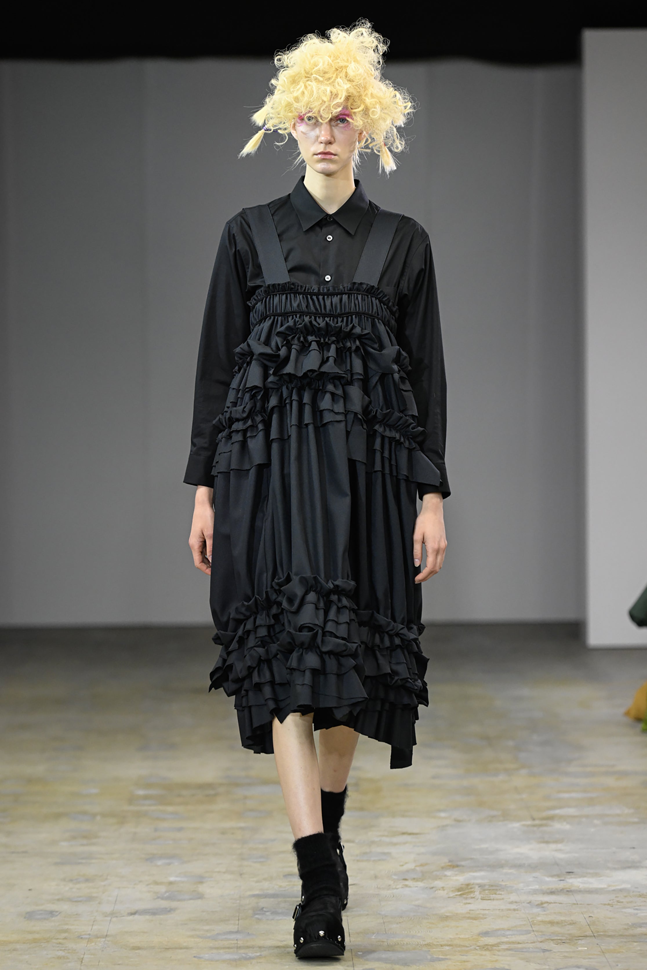 Fashion model wearing a tao AW26 outfit