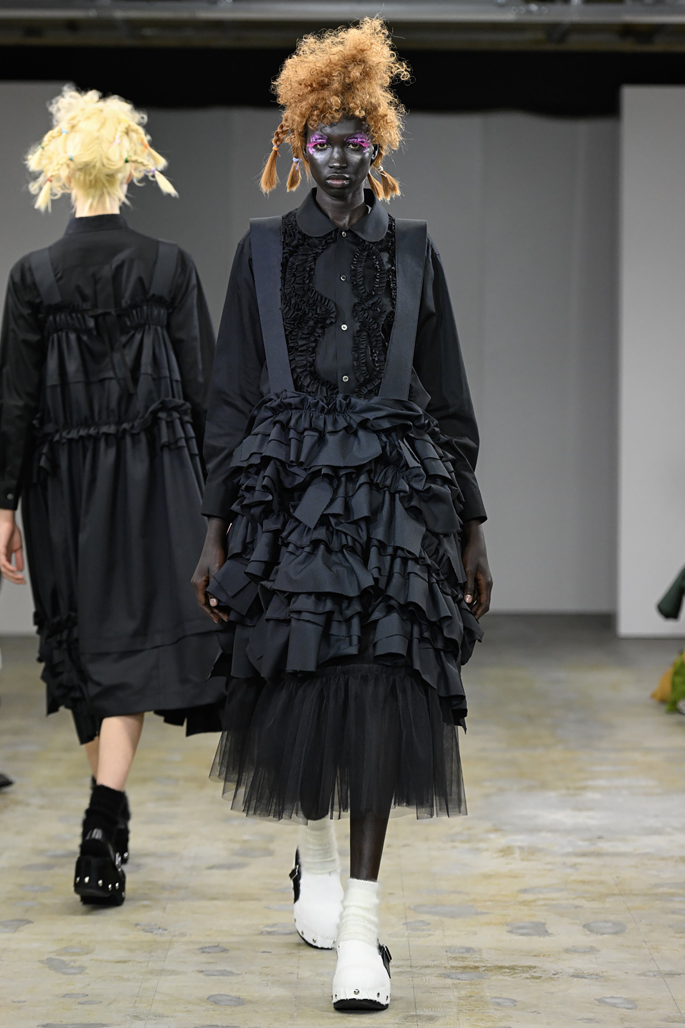 Fashion model wearing a tao AW26 outfit