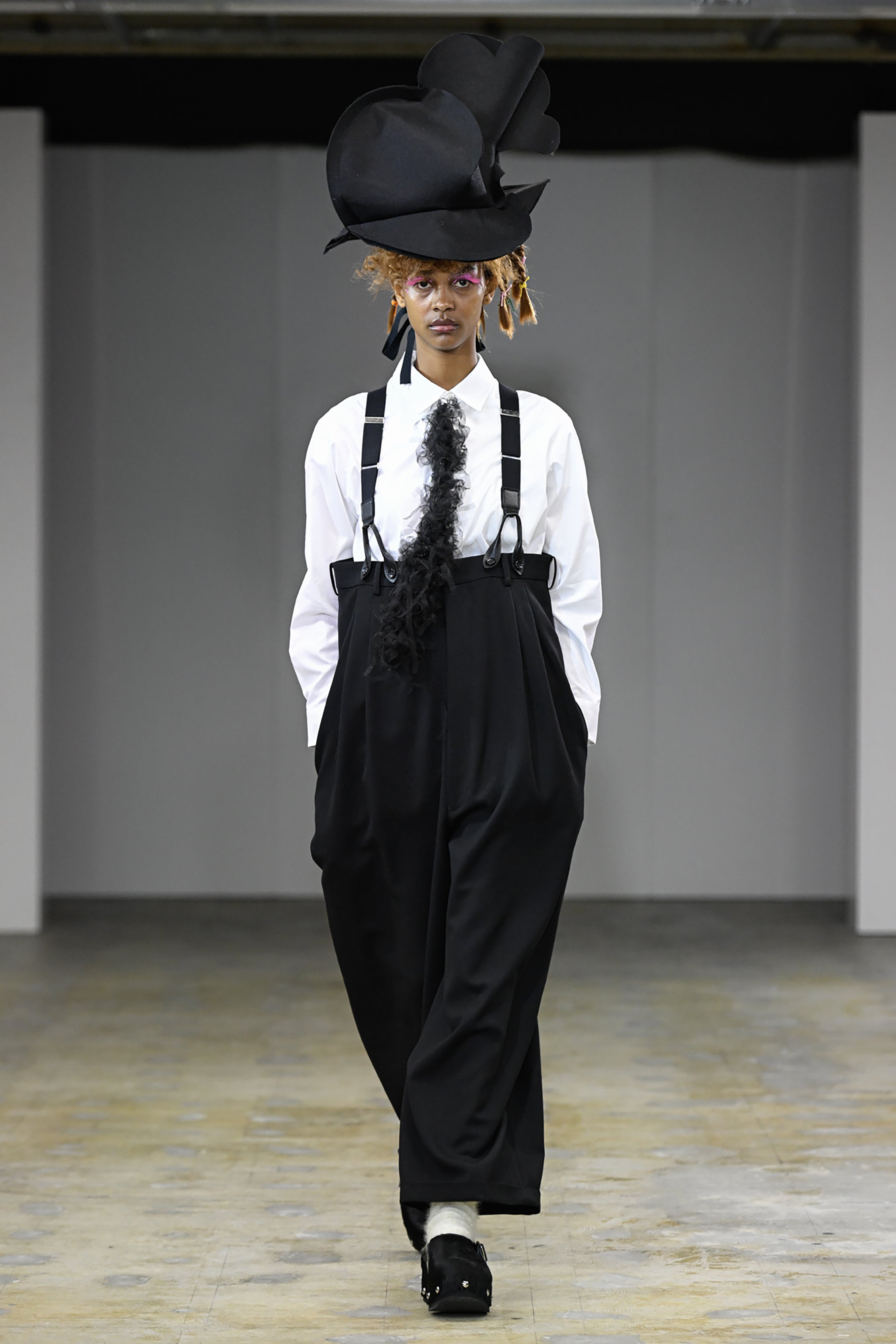 Fashion model wearing a tao AW26 outfit