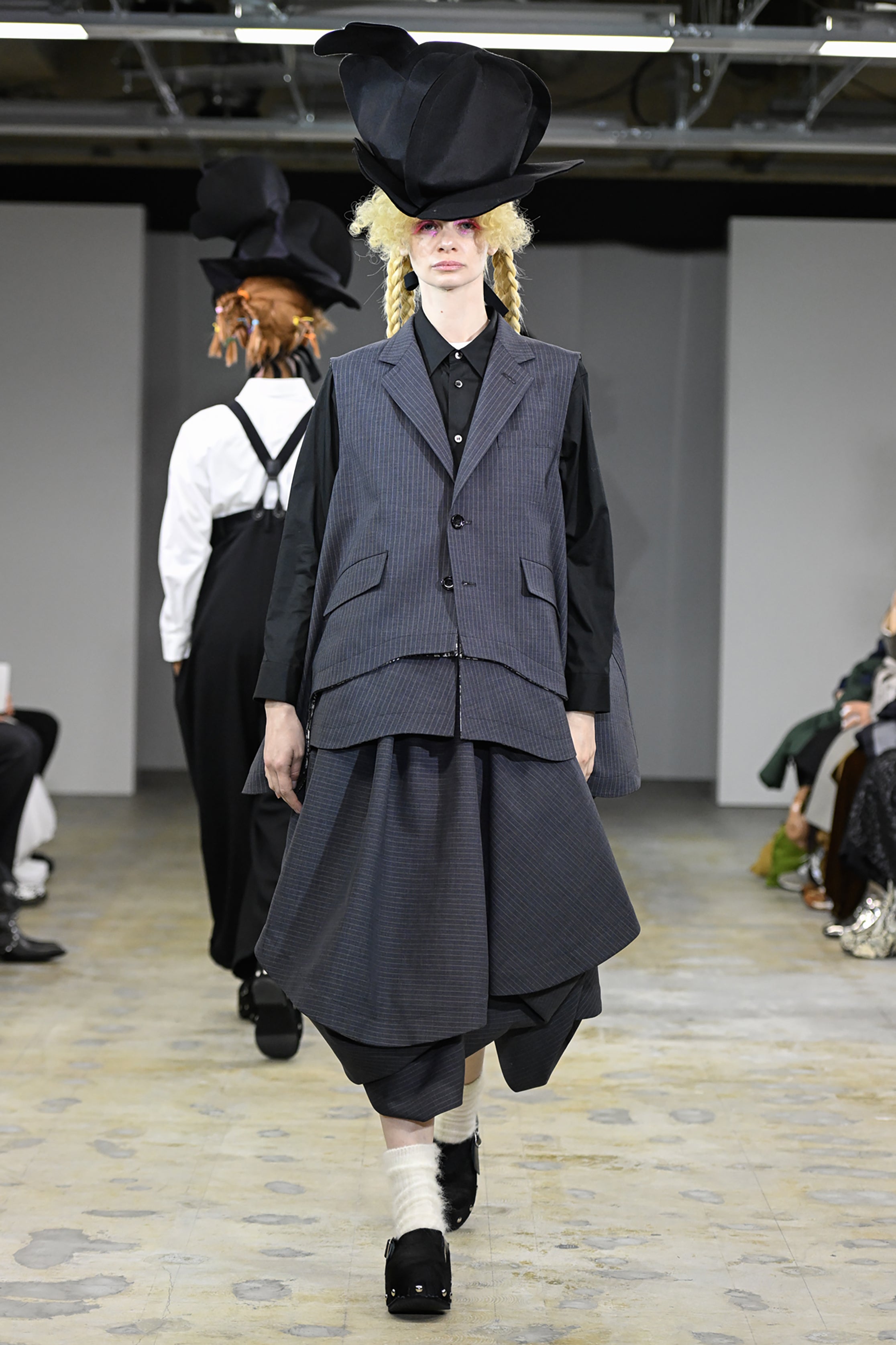 Fashion model wearing a tao AW26 outfit