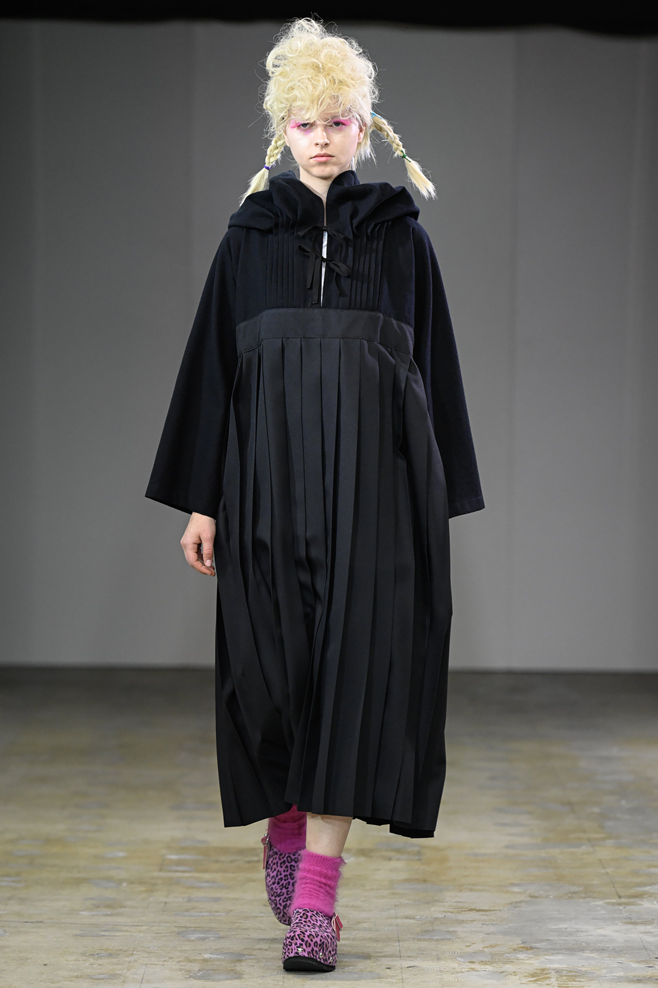 Fashion model wearing a tao AW26 outfit