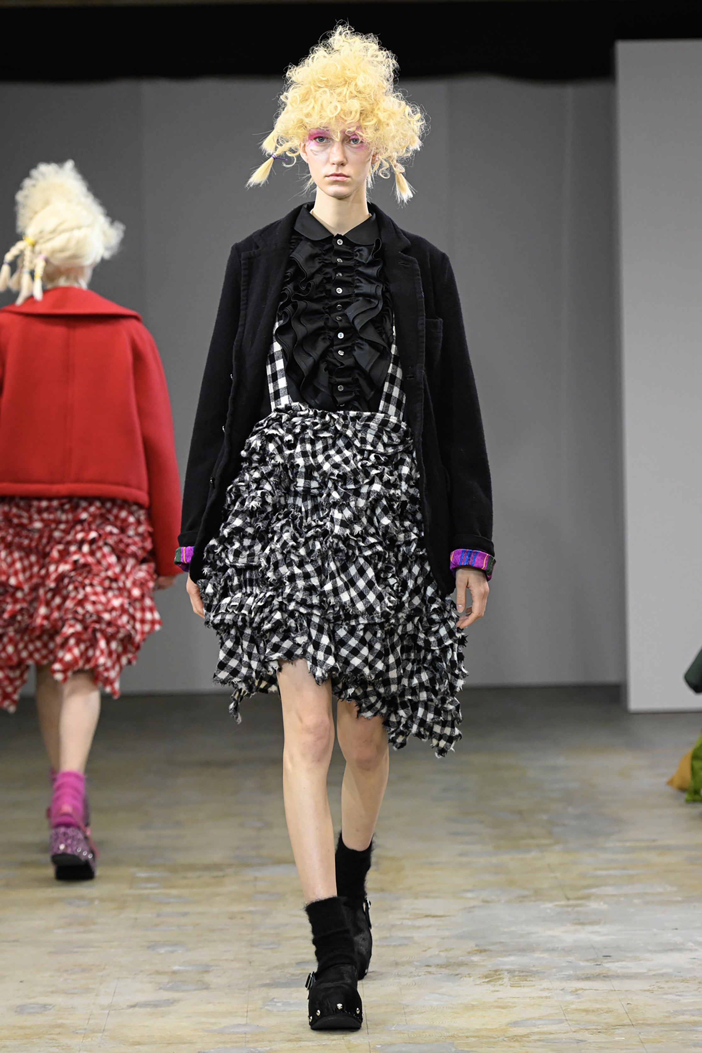 Fashion model wearing a tao AW26 outfit