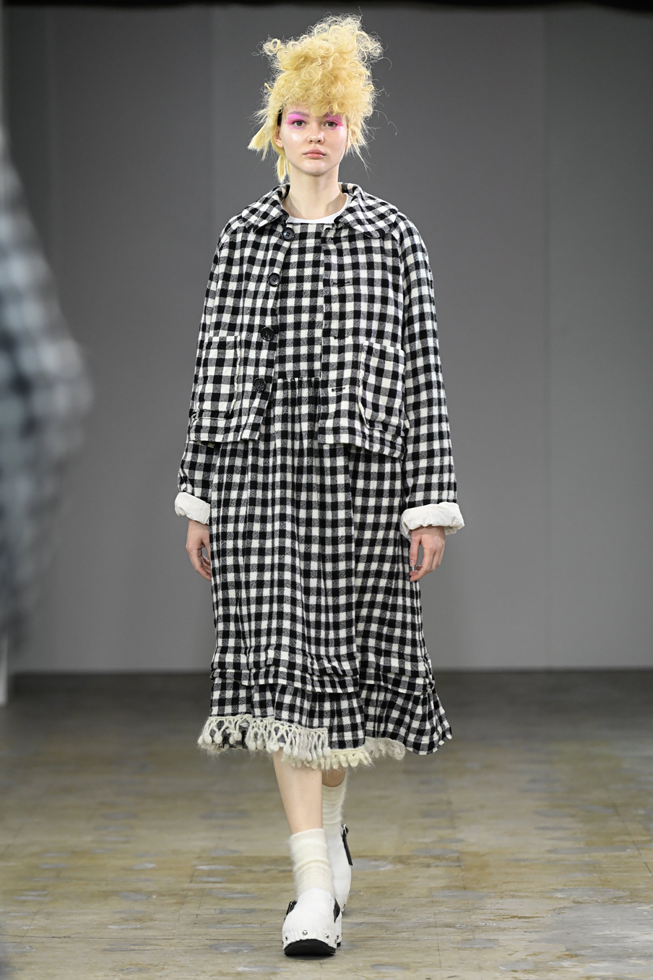 Fashion model wearing a tao AW26 outfit