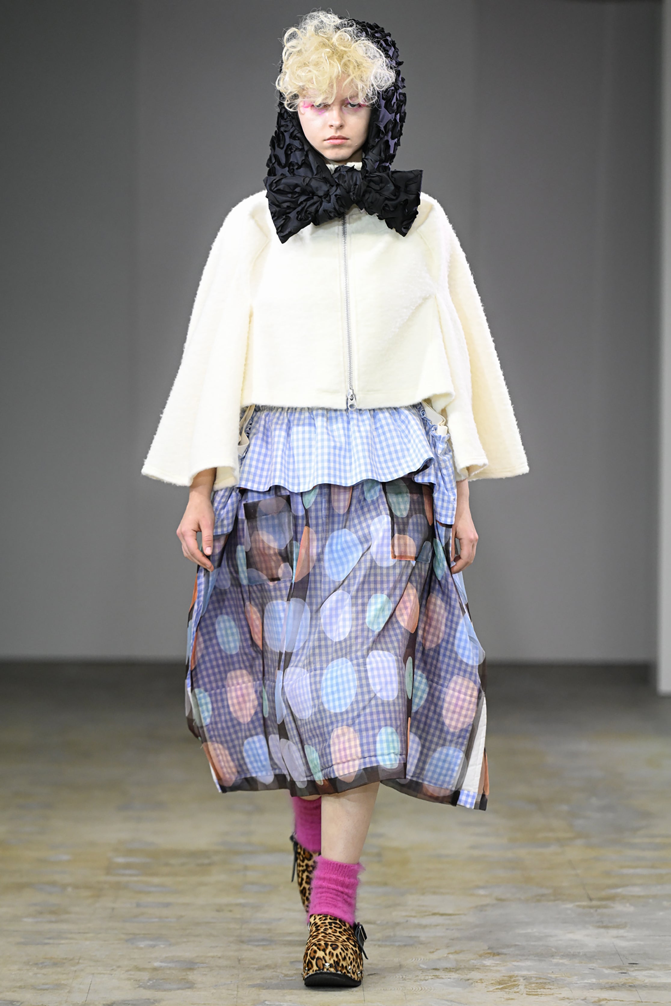 Fashion model wearing a tao AW26 outfit