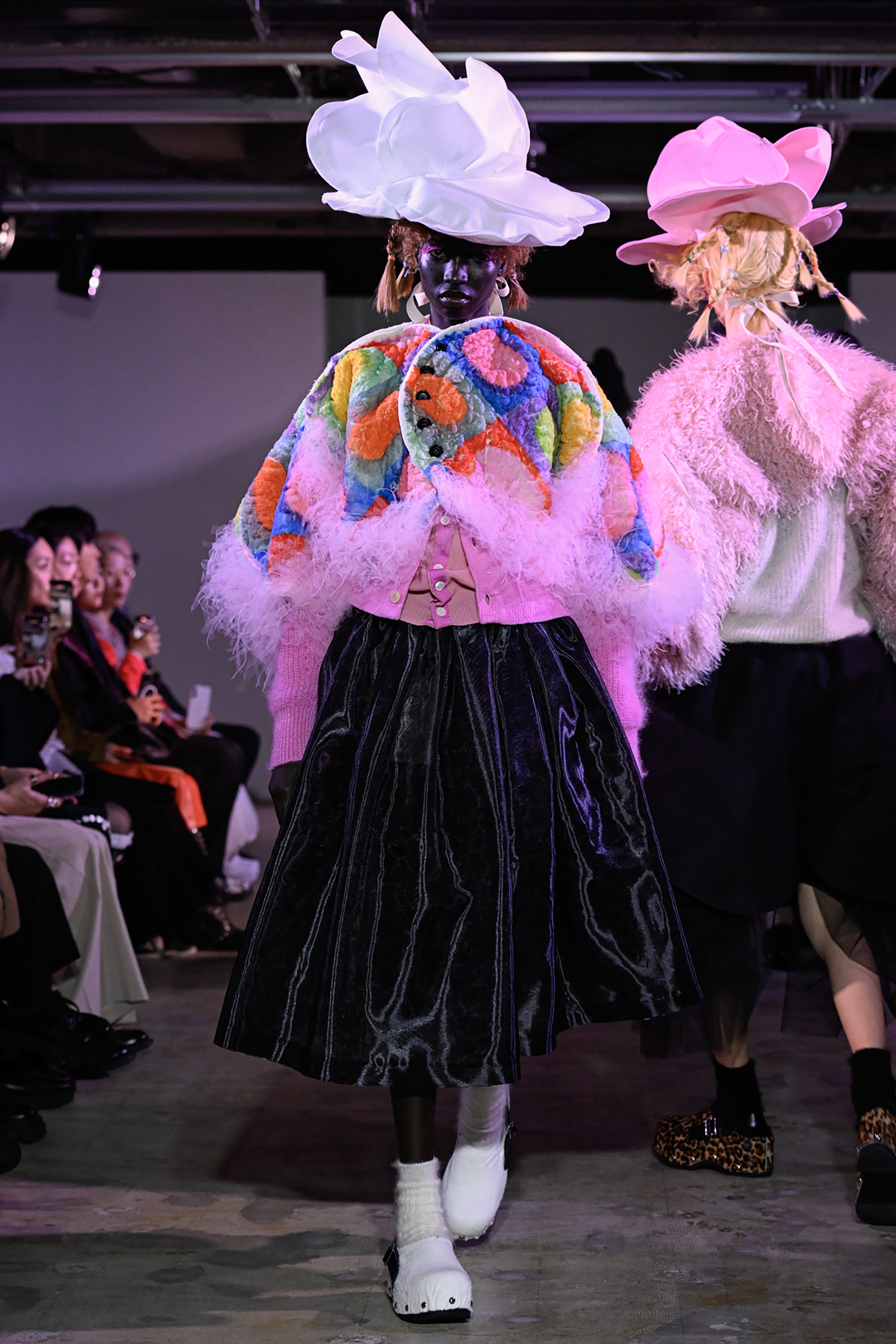 Fashion model wearing a tao AW26 outfit