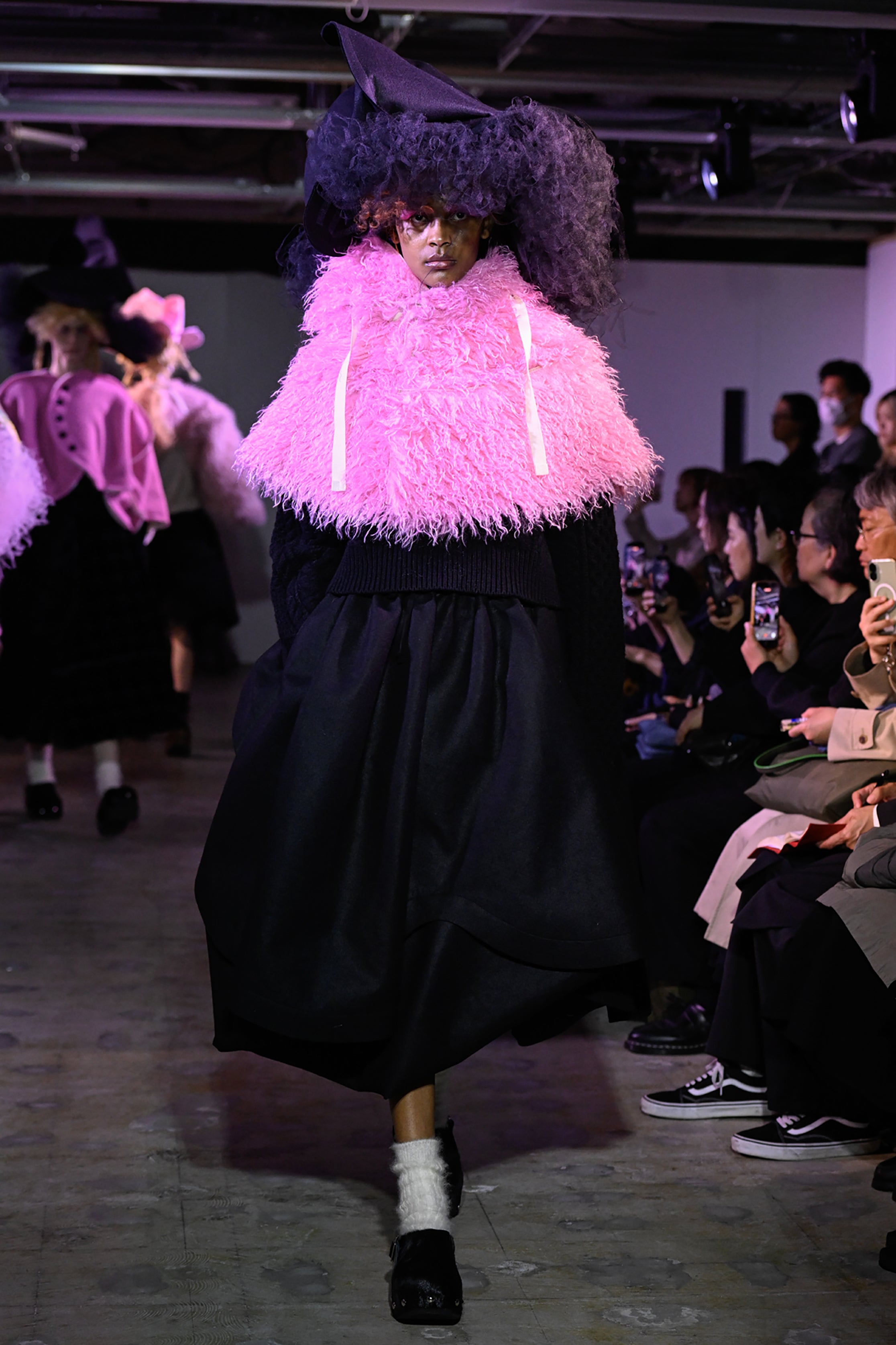 Fashion model wearing a tao AW26 outfit