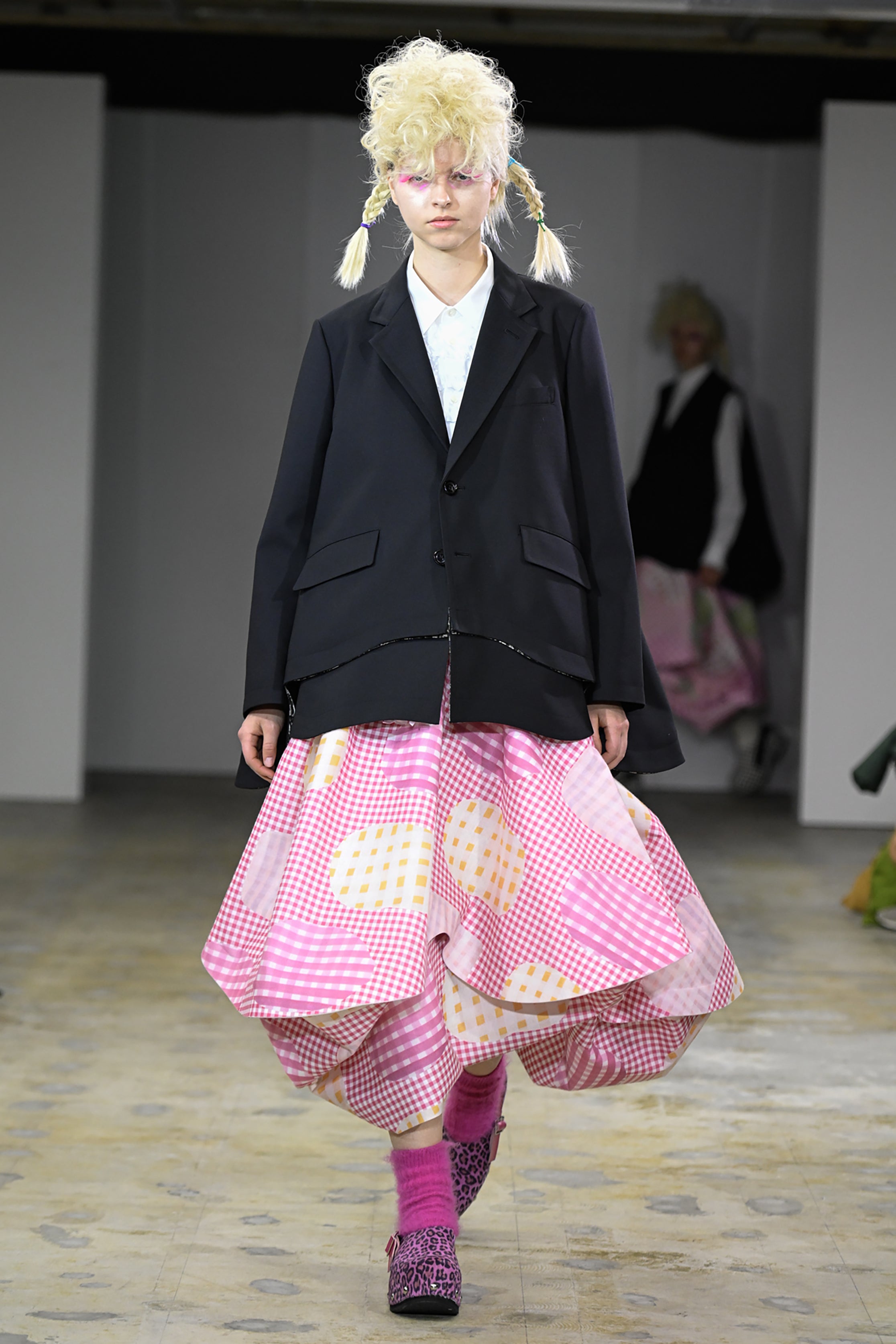 Fashion model wearing a tao AW26 outfit