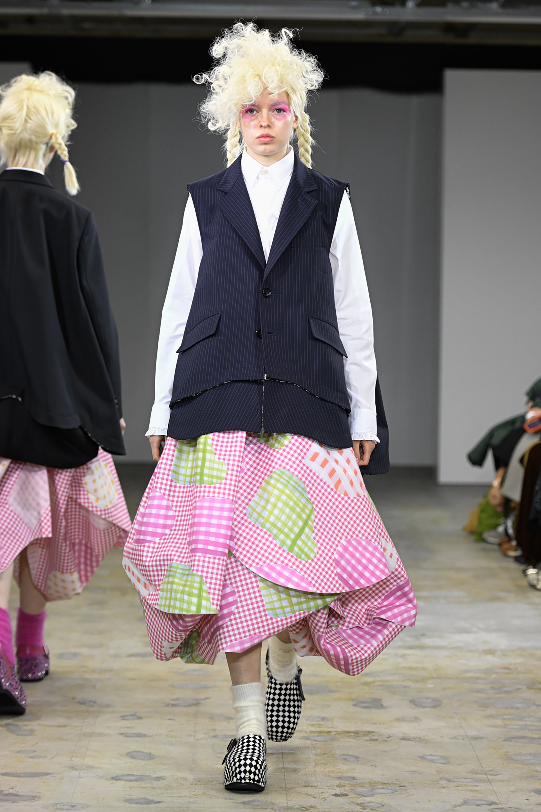 Fashion model wearing a tao AW26 outfit